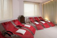 a group of red chairs in a room at Clarion Congress Hotel Olomouc in Olomouc