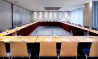 a large conference room with a long table and chairs at Clarion Congress Hotel Olomouc in Olomouc