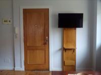 Televízia a/alebo spoločenská miestnosť v ubytovaní Apartamento LA FRAGUA