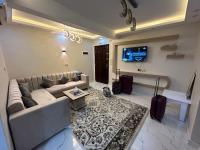 TV a/nebo společenská místnost v ubytování Apartment Hossam - Hurghada