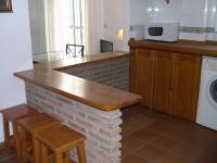 Kuchyň nebo kuchyňský kout v ubytování Apartamentos Turísticos La Mundial