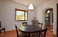 a kitchen and dining room with a table and chairs at Pet Friendly Home In Fauglia With Wifi in Fauglia