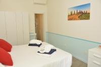 Posteľ alebo postele v izbe v ubytovaní Golfo del Sole Hotel & Holiday Resort