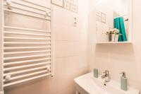 Kúpeľňa v ubytovaní BpR Szondi Cozy Apartment