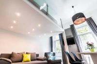 Televízia a/alebo spoločenská miestnosť v ubytovaní BpR Szondi Cozy Apartment