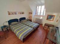 Posteľ alebo postele v izbe v ubytovaní gîte en bord de Loire