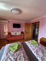 Posteľ alebo postele v izbe v ubytovaní Apartment Elena