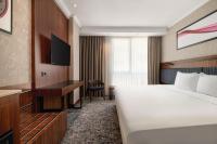 Postel nebo postele na pokoji v ubytování Ramada by Wyndham Gaziantep