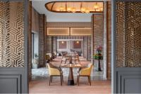 a restaurant with tables and chairs in a room at Vivanta Tawang in Tawang