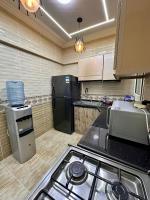Kuchyň nebo kuchyňský kout v ubytování new apartment in Cairo