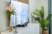 TV a/nebo společenská místnost v ubytování Luxurios One Bedroom High Floor