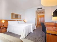 Hotel Zentral Leónにあるベッド
