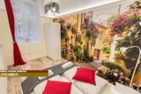 Posteľ alebo postele v izbe v ubytovaní Little Americas Main Street Apartments