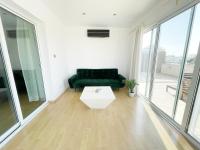 Posezení v ubytování Rooftop Penthouse with Private Jacuzzi and Panoramic Terrace in Center of Larnaca