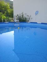 Bazén v ubytování Family friendly apartments with a swimming pool Palit, Rab - 4990 nebo v jeho okolí