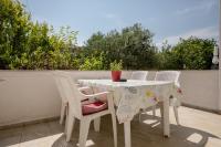 Balkón nebo terasa v ubytování Family friendly apartments with a swimming pool Palit, Rab - 4990