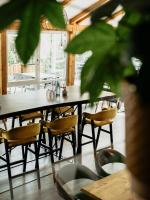 a dining room with a table and chairs at Botanico Finkenrech Hotel&Restaurant in Eppelborn