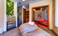Posteľ alebo postele v izbe v ubytovaní TATRA SUITES Vila HIMALAYA