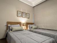 Postel nebo postele na pokoji v ubytování Mynt Stay zed west Residence 2 bedroom E1E293
