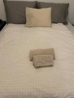 MP Tripla Luxury Apartment Helsinkiにあるベッド