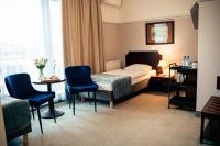 Posteľ alebo postele v izbe v ubytovaní Hotel Kuracyjny Spa & Wellness