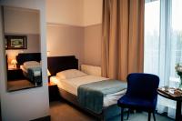 Posteľ alebo postele v izbe v ubytovaní Hotel Kuracyjny Spa & Wellness