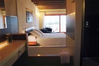 Posteľ alebo postele v izbe v ubytovaní Hotel Cal Naudi