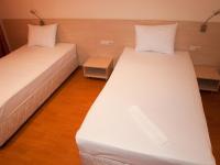 Hotel Astraにあるベッド