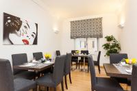 A seating area at Domus Best Guest House