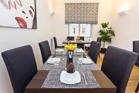 A seating area at Domus Best Guest House