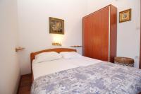 Posteľ alebo postele v izbe v ubytovaní Apartment Grandi 1