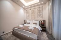 Damas Suites Budapestにあるベッド