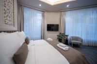 Damas Suites Budapestにあるベッド