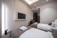 Damas Suites Budapestにあるベッド