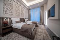 Damas Suites Budapestにあるベッド