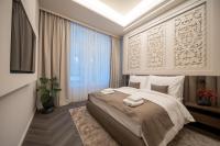 Damas Suites Budapestにあるベッド