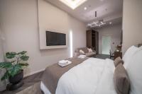 Damas Suites Budapestにあるベッド