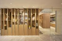 a store lobby with wooden walls and a glass door at voco Seoul Myeongdong by IHG in Seoul