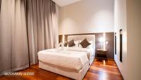 Harmony Luxury Suites At The Manor KLCCにあるベッド