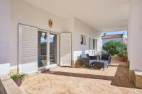 Patio alebo iná vonkajšia časť ubytovania Villa S´Aguila