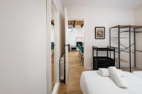 Postel nebo postele na pokoji v ubytování BeBarceloner Eixample Apartments - 4 bedrooms