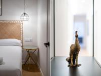 Postel nebo postele na pokoji v ubytování BeBarceloner Eixample Apartments - 4 bedrooms