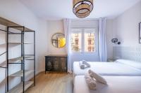 Postel nebo postele na pokoji v ubytování BeBarceloner Eixample Apartments - 4 bedrooms