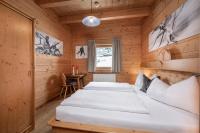 Łóżko lub łóżka w pokoju w obiekcie AUSTRIA APPART - natural Lifestyle Appartements auf der Piste