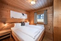 Łóżko lub łóżka w pokoju w obiekcie AUSTRIA APPART - natural Lifestyle Appartements auf der Piste