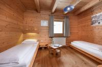 Łóżko lub łóżka w pokoju w obiekcie AUSTRIA APPART - natural Lifestyle Appartements auf der Piste