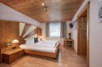 Łóżko lub łóżka w pokoju w obiekcie AUSTRIA APPART - natural Lifestyle Appartements auf der Piste