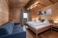 Łóżko lub łóżka w pokoju w obiekcie AUSTRIA APPART - natural Lifestyle Appartements auf der Piste