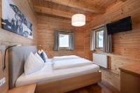 Telewizja i/lub zestaw kina domowego w obiekcie AUSTRIA APPART - natural Lifestyle Appartements auf der Piste