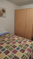 Postel nebo postele na pokoji v ubytování Apartamento Pepe